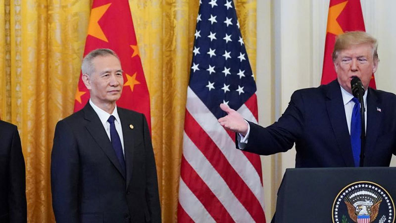 Chơi tất tay, Trung Quốc lùi bước, thỏa thuận Giai đoạn 1 được xem là một chiến thắng của ông Donald Trump.